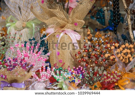 Crowd of colorful trinkets and souvenirs for sale 