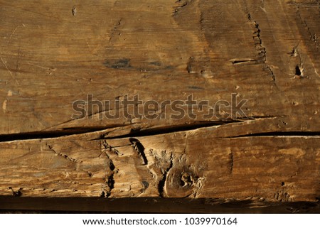 wooden beam. old house. a wall from a bar a fragment.