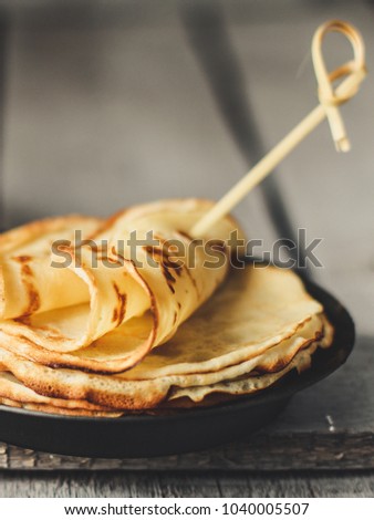 Pancakes - fresh and tasty
Pancakes (crepes) on a wooden surface