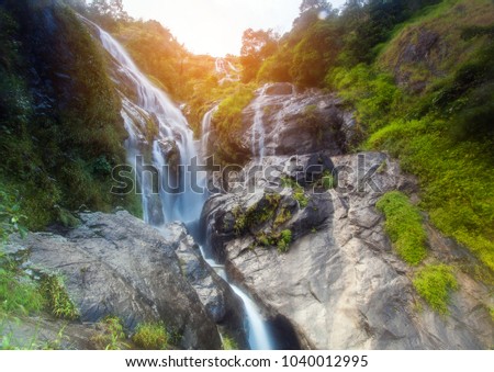 Waterfall hidden in the tropical jungle