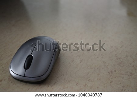Gray computer mouse clicker.