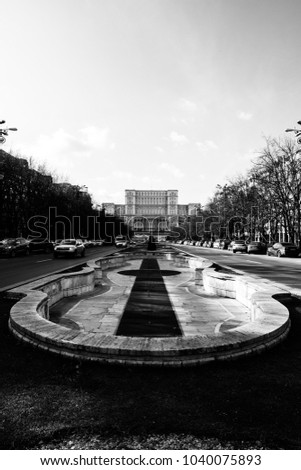 March 06, 2018 Parliament building in Bucharest Romania also called Casa Poporului in black and white. Large building built in Nicolae Ceausescu socialist Romania black and white photography