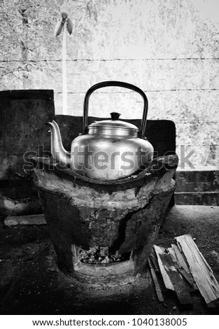 Kettle on charcoal stove, black and white picture, Traditional Thai kitchen