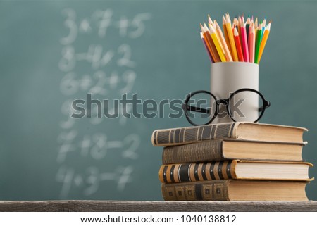 Color pencils with stack book Royalty-Free Stock Photo #1040138812