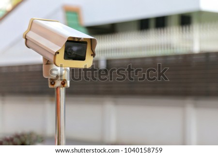 CCTV security camera on pole, operating inside the building with copy space. concept of safety control, crime protect.