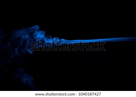 Blue smoke abstract on black background