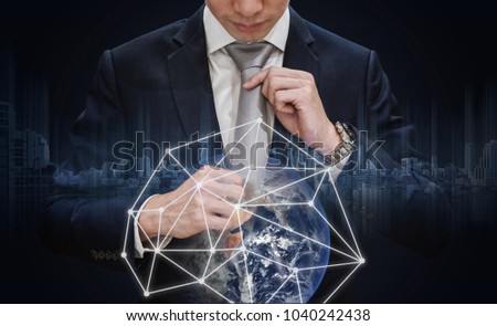 Double exposure, businessman holding necktie with global network connection, Global business and business network connection technology. Element of this image are furnished by NASA