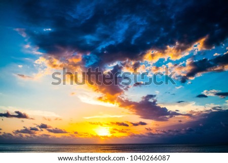 Scenic clouds sunset sky background, Nature composition cloudscape.
Beautiful cloudscape over the sea, sunrise shot.
Sunset at ocean. Sunset on the tropical beach. Legian beach on Bali island. 