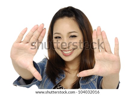happy young casual woman showing something on the palms of her hands