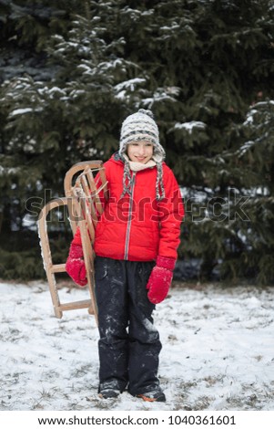 winter fun, boy  with sleigh