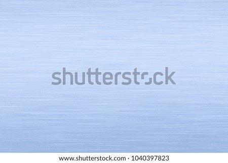Brushed blue metal texture. Polished metal texture background with light reflection.