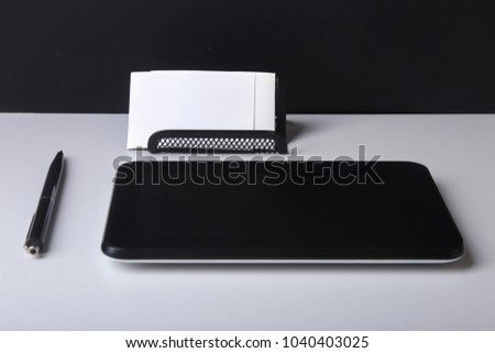Business concept. Top view of kraft spiral notebook, glasses, smartphone and black pen isolated on background for mockup.