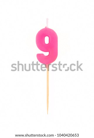 Birthday candle in the form of nine figures (numbers, dates) for cake isolated on white background. The concept of celebrating a birthday, anniversary, important date, holiday, table setting, cake dec