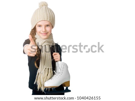 cute little girl with figure skates