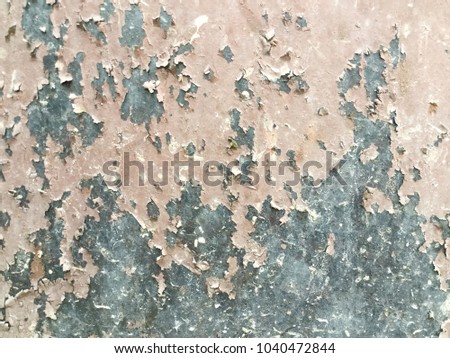 Peeling paint on a metal surface