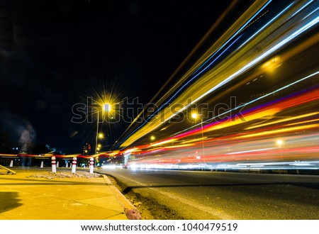 Rajpath in night lights located in New Delhi of India, Asia. Night photography on Rajpath's roads. This road connects the famous India Gate war memorial and Rashtrapati Bhavan aka President's House. Royalty-Free Stock Photo #1040479519