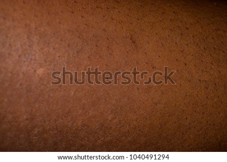 Human skin texture: Dark Brown African skin of woman