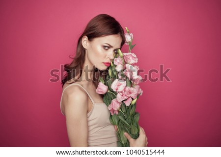 woman with pink flowers, tenderness           