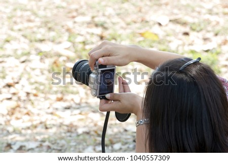 Women are taking photos