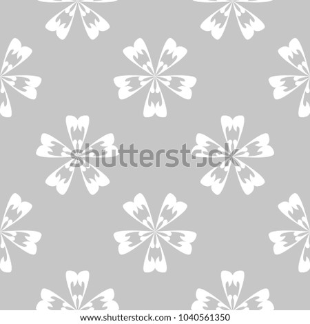 White floral ornament on gray background. Seamless pattern for textile and wallpapers