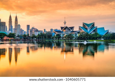 Kuala Lumpur, Malaysia. Sunset skyline from Titiwangsa Park. Royalty-Free Stock Photo #1040605771