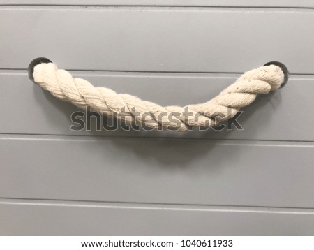 A decorative twisted Rope handles