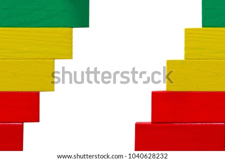Concept of building success foundation, Arrangement colorful puzzle wooden blocks left and right in the shape of a staircase isolated white background