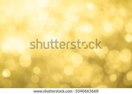 Golden light bokeh abstract background.