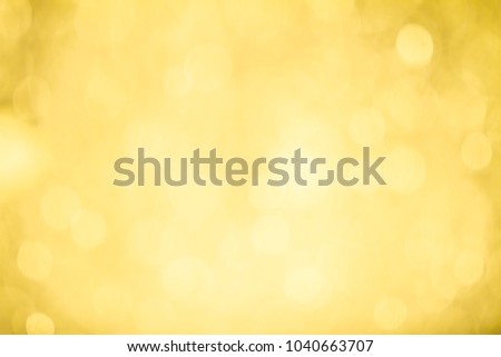 Golden light bokeh abstract background.
