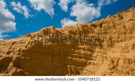 sandy ravine and sky. Spring landscape. In the countryside. Panorama. Ukraine. Europe.