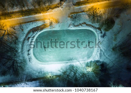 Natural ice rink at night, Helsinki, Finland