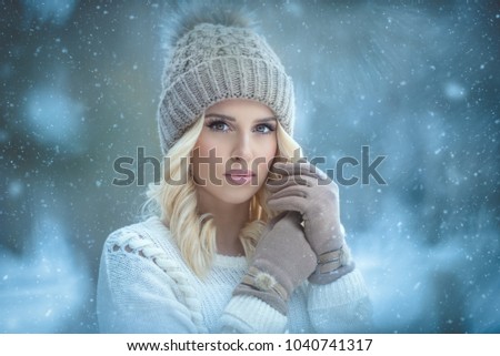 Attractive young woman in wintertime outdoor