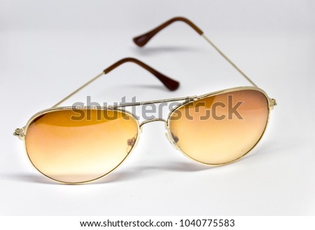 Photograph of a pair of sunglasses in lightbox