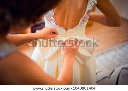 preparations for the wedding ceremony the bride, hairstyle, makeup, beauty Royalty-Free Stock Photo #1040801404