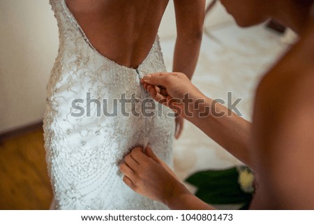 preparations for the wedding ceremony the bride, hairstyle, makeup, beauty Royalty-Free Stock Photo #1040801473