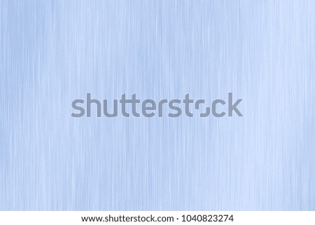Brushed blue metal texture. Polished metal texture background with light reflection.