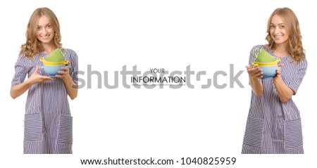Beautiful young woman set plates in hands kitchen food set pattern on a white background isolation