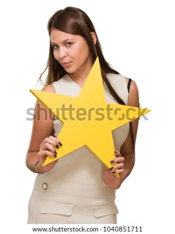 Portrait Of Young Woman Holding A Star On White Background
