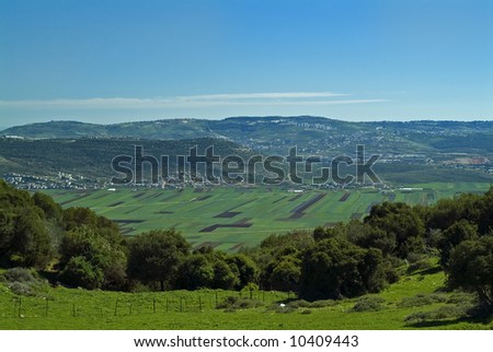 view of Beit Netofa valley in the Galilee, Israel, with Nazaret on the horizon