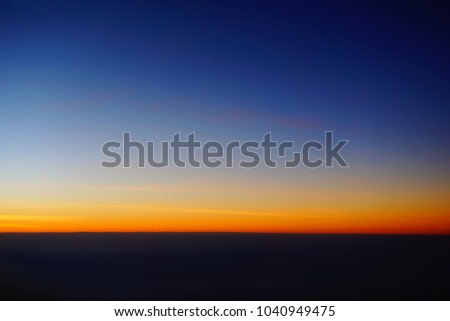 Abstract Sunset Photo from Airplane, Sunset sky background, pictured from 
plane. Beautiful sky as twilight times, Space for text in template. 