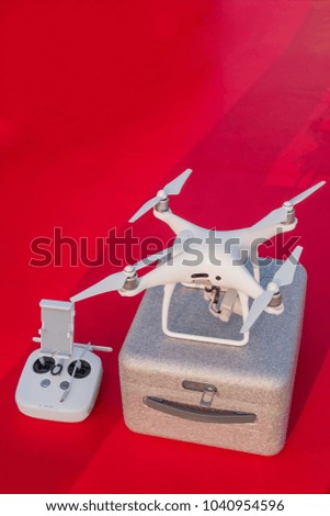 white drone isolated on color background
