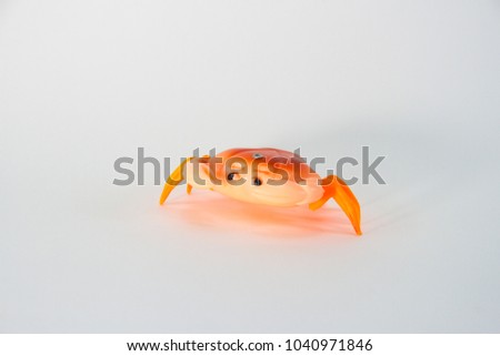 Crab, Plastic Toy Animal isolated on white background.