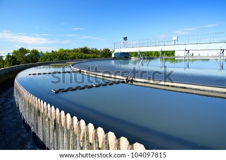 Modern urban wastewater treatment plant. Royalty-Free Stock Photo #104097815