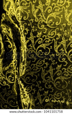 silk cloth Royal monogram. Yellow is dark. This is a black silk velvet with a royal gold seal, creating a negative space patterned picture. Light weight, great for design.