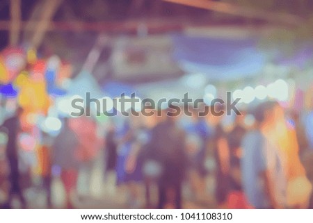 (Vintage tone) Festival Event night time with People in city Blurred defocused Bokeh abstract Background
