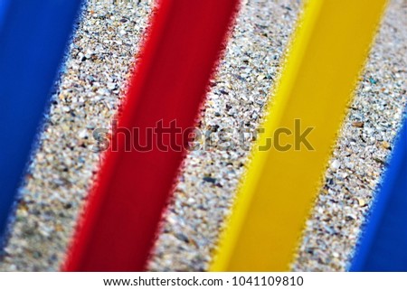 abstract photograph of flat bars of defocused colors with ground phono,