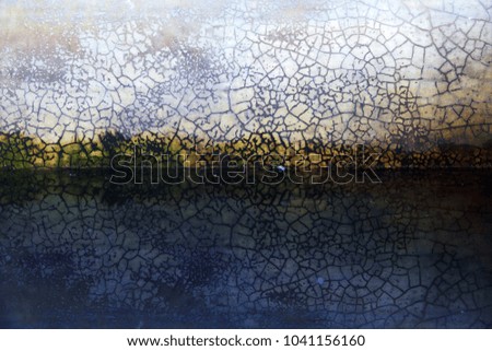 grunge background of abstract cracked cement and reflection