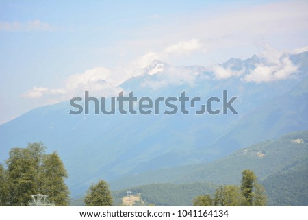 Mountains in clouds on the nature picturesque photo