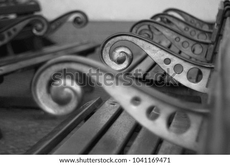 Wrought Iron Garden Bench in black and white