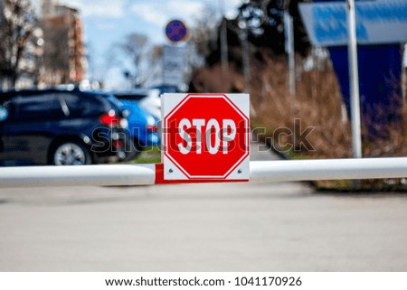 barrier with stop sign